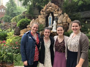 Group of students in front of statue in Shanghai gardens