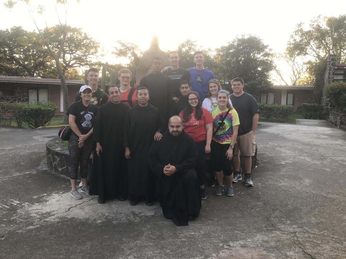 Group Picture of students and monks as part of Study Abroad Mexico