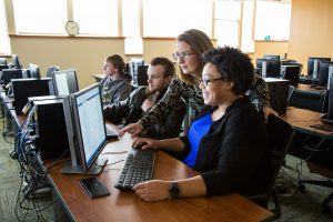business data analyst students at Saint Vincent learning to become future data analysts